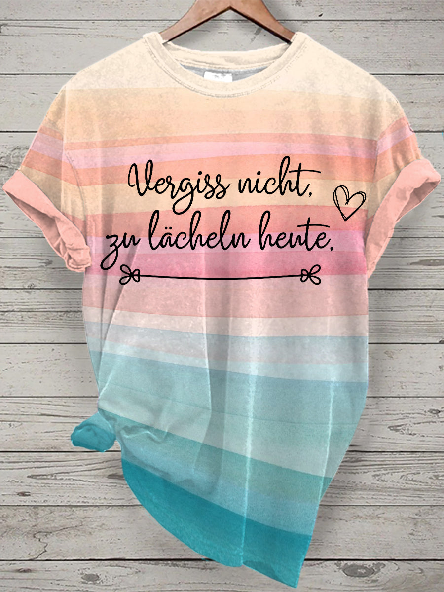 Damen T-Shirt „Vergiss nicht zu lächeln heute.“ – Kurzarmshirt mit Streifenverlauf & positiver Botschaft Bunt / S