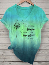 Damen T-Shirt „Wer im Herzen Frieden findet, dem gehört die Welt“ – V-Ausschnitt mit Löwenzahn & Spruch im Tie-Dye Design