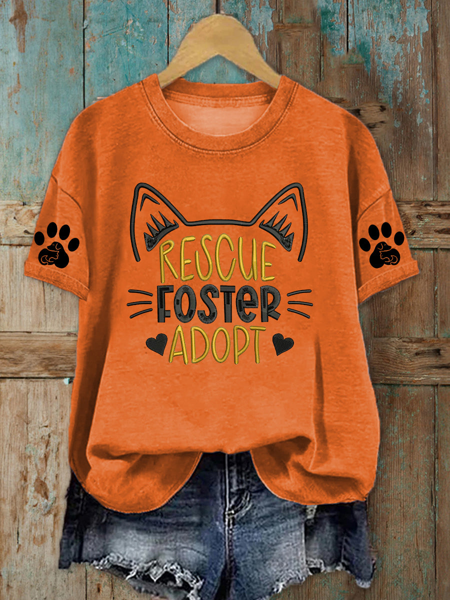 Damen T-Shirt mit „Rescue Foster Adopt“-Print – Tierliebes Statement-Shirt aus Baumwollmix Orange / S