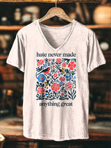 Damen T-Shirt mit Botschaft “Hate Never Made Anything Great” – Blumen & Vogel Folk-Art Print, V-Ausschnitt